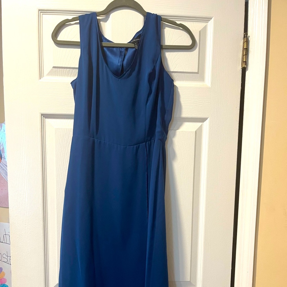 Size 6 White House Black Market asymmetrical midi dress. Deep blue color.